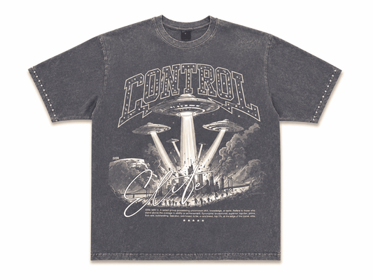 A dark gray mineral-wash graphic t-shirt featuring a white and gray retro sci-fi design with the word 'CONTROL' and a UFO illustration, displayed flat against a white background.